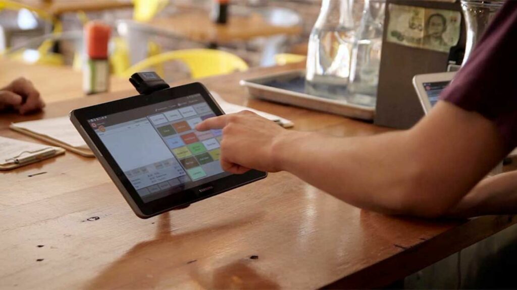 this image shows Tableside Ordering with POS Systems